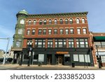 Small photo of Brighton, Massachusetts, USA – February 12, 2023: Rourke's or Washington building, dating from 1909, in Washington and Market Street intersection.