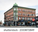 Small photo of Brighton, Massachusetts, USA – February 14, 2023: Rourke's or Washington building, dating from 1909, in Washington and Market Street intersection.