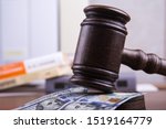 Small photo of Judge's gavel, bills of american dollars as concept business, finance corruption, cash deposit.
