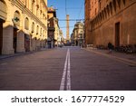 Small photo of Ugo Bassi street in a deserted city due to Covid-19 virus in Bologna, Italy. The largest city and the capital of the Emilia-Romagna Region in Italy.