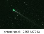 Small photo of Green comet in dark space. Elements of this image furnished by NASA. High quality photo