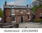 Small photo of Himley, Staffordshire, UK - 05th May 2023. Its name and distinctive appearance were the result of 19th-century mining subsidence which causes coins and balls to roll uphill ! ( an optical illusion )