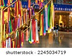 Wish ribbons in Buddhist temple in Kek Lok Si temple, George Town, Penang, Malaysia. TRANSLATON: Love, Money, Success, Health