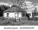 Small photo of Beautiful old abandoned building farm house in countryside on natural background, photography consisting of old abandoned building farm house at wild grass, old abandoned building farm house over sky