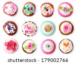 cupcakes with beautiful decoration isolated over white background. shoot from top