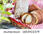 Hungarian traditional sweet food Kurtoskalacs, alos called chimney cake in basket - macro shot