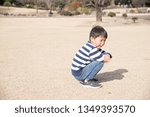 Small photo of A boy who shed tears in the park