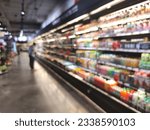Abstract blurred Consumer select product or goods in the supermarket or convenience store.