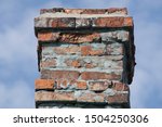 Old Chimney With Cracked Brick