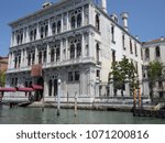 Small photo of Venice, Veneto, Italy - June 2, 2014: The river entrance to the Municipal Casino seen from the Grand Canal. The renaissance building houses since 1946, the winter home of the oldest gaming house in th