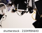 Small photo of Top view to old laptop computers, digital tablets, mobile phones, many used electronic gadgets devices on white table. Planned obsolescence, electronic waste for recycling concept
