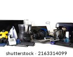 Small photo of Old computers, digital tablets, mobile phones, many used electronic gadgets devices, broken household and appliances. Planned obsolescence, electronic waste for recycling concept