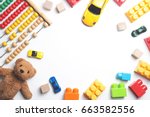Kids toys frame on white background. Top view. Flat lay. Copy space for text