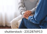 Small photo of Closeup image of a couple women holding each other hands for comfort and sympathy