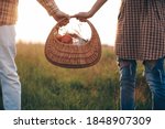 Closeup of picnic basket. Couple in love. Love story. 