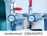 Small photo of Pressure gauge on a gas regulator in a laboratory analytical equipment.