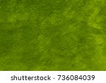 Green carpet texture background.