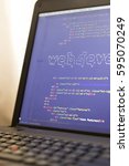 Small photo of Web development phrase ASCII art inside HTML code close up. Web developing concept on screen. Abstract information technology modern background. Laptop in sunset lights. Code is created by myself.