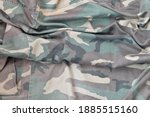 Small photo of Camouflage background texture as backdrop for russian or ussr snipers design projects. Back side of snipers camouflage jacket with many pleats on crumpled fabric