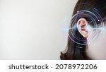 Small photo of Ear of young woman with sound waves simulation technology. Concept of hearing test, hearing aids, ear disorders and health care.