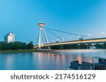 Small photo of Bratislava, Slovakia - May 31, 2022: Most SNP (Bridge of the Slovak National Uprising) known also as UFO Bridge, Novy most or New Bridge at dusk.