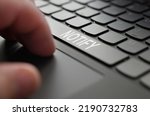 Small photo of Technology and business concept. On the laptop keyboard of a person's hand, on the space bar there is an inscription - NOTIFY