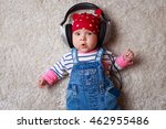 Funny Baby In A Big Headphones. ...
