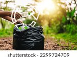 Small photo of recycling, eco, save, plastic bottle, plastic, environmental, reuse, ecological, bag, trash. plastic bottles let down to trash or recycle bag. to save environmental reuse plastic and bottle.