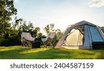Small photo of nature, tent, camp, vacation, adventure, campground, grass, trip, campfire, camping. selective focused on lawn or green grass ground of camping ground, with camping tent in background and sunlight.