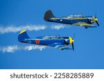 Small photo of Madrid, Spain- February 5, 2023: Air show of vintage airplanes over the sky of Madrid. Planes in acrobatic formation model Yack 52. old planes