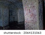 Small photo of SAN ANDRES DE PISIMBALA, COLOMBIA - SEPTEMBER 12, 2015: Decoration of an ancient tomb located in Alto de San Andres site in Tierradentro, Colombia.