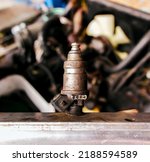 Small photo of Close up of old broken gas sequential injectors of the Propane or LPG Liquefied Petroleum Gas alternative fuel system of a car.
