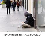 An Unidentified Homeless Man...