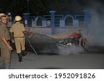 Small photo of Burdwan Town, Purba Bardhaman District, West Bengal (India) - 08.04.2021: Panic ensued when an unclaimed bike caught fire in the Purba Bardhaman District Court Compound.
