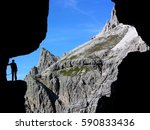 Small photo of Hiker on the Warpath Alpini-Trail of the 1. World War, Dolomites of Sexten, South Tirol, Italy