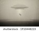 UFO kidnaps a cow . Photo with 3d rendering element and vintage film camera effects