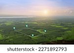 Land in aerial view including real estate landscape, green field, agriculture plant, pin location icons for housing department, housing, development, own, sell, rent, buy or investment.