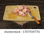 Small photo of Baked turkey saute, meat saute, hair roaster. The whole story of chopping, marinating, cooking and serving. On wooden rustic table. Natural environment. Perspective.