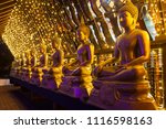 Small photo of Buddha statues at the Seema Malaka buddhist temple on Beira Lake, Colombo, Sri Lanka. Seema Malaka is a part of Gangaramaya Temple.