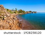 Rocky beach in the centre of Side town, situated in Antalya region on the southern Mediterranean coast of Turkey.