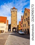 Small photo of Rothenburg ob der Tauber, Germany - July 11, 2021: Roeder Gate Tower or Rodertor in Rothenburg ob der Tauber old town. Rothenburg is a city in the region of Bavaria, Germany.