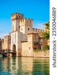 Small photo of Scaligero Castle is a fortress in the historical center of Sirmione town at the Garda Lake in Italy