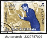 Small photo of RAS AL-KHAIMAH - CIRCA 1965: a stamp printed in Ras al-Khaimah shows John Fitzgerald Kennedy, was an American politician who served as the 35th president of the United States, circa 1965