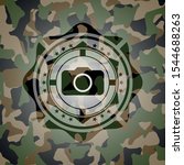 photo camera icon on camouflaged pattern