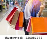 woman holding shopping bag in mall
