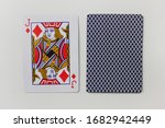 Small photo of Playing cards deck isolated on white empty background in Moscow on March 2020. A jack or knave tiles playing card close up top view