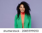 Small photo of Vivid swanky happy young black curly woman 20s years old wears green shirt looking camera smiling isolated on plain pastel light violet background studio portrait. People emotions lifestyle concept