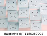 Unhappy Sad Emotion Face On Sticky Notes. Unhappy Employee Or Demotivated At working place.