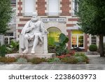 Small photo of Sully-sur-Loire, France - Oct 1 2022; Statue of Maximilien de Bethune, Duke of Sully in front of The Francoise Kuypers Civic Centre