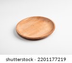 Wooden Plate isolated on white background with a 45 degree angle setup